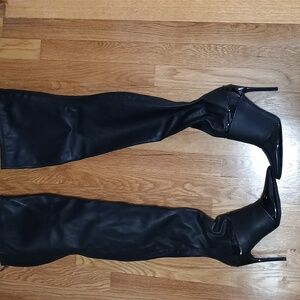 Black thigh high boots Size 8.5. Patent leather on toe and heels. NWOB.